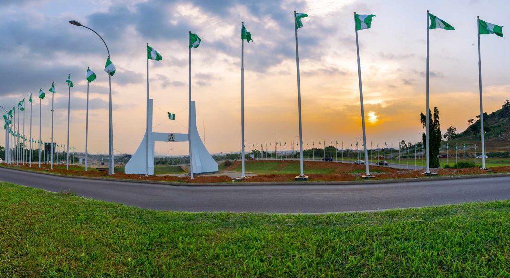 Abuja city gate with National flags